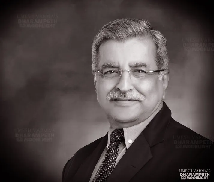 Monochrome portrait of a senior gentleman in a suit